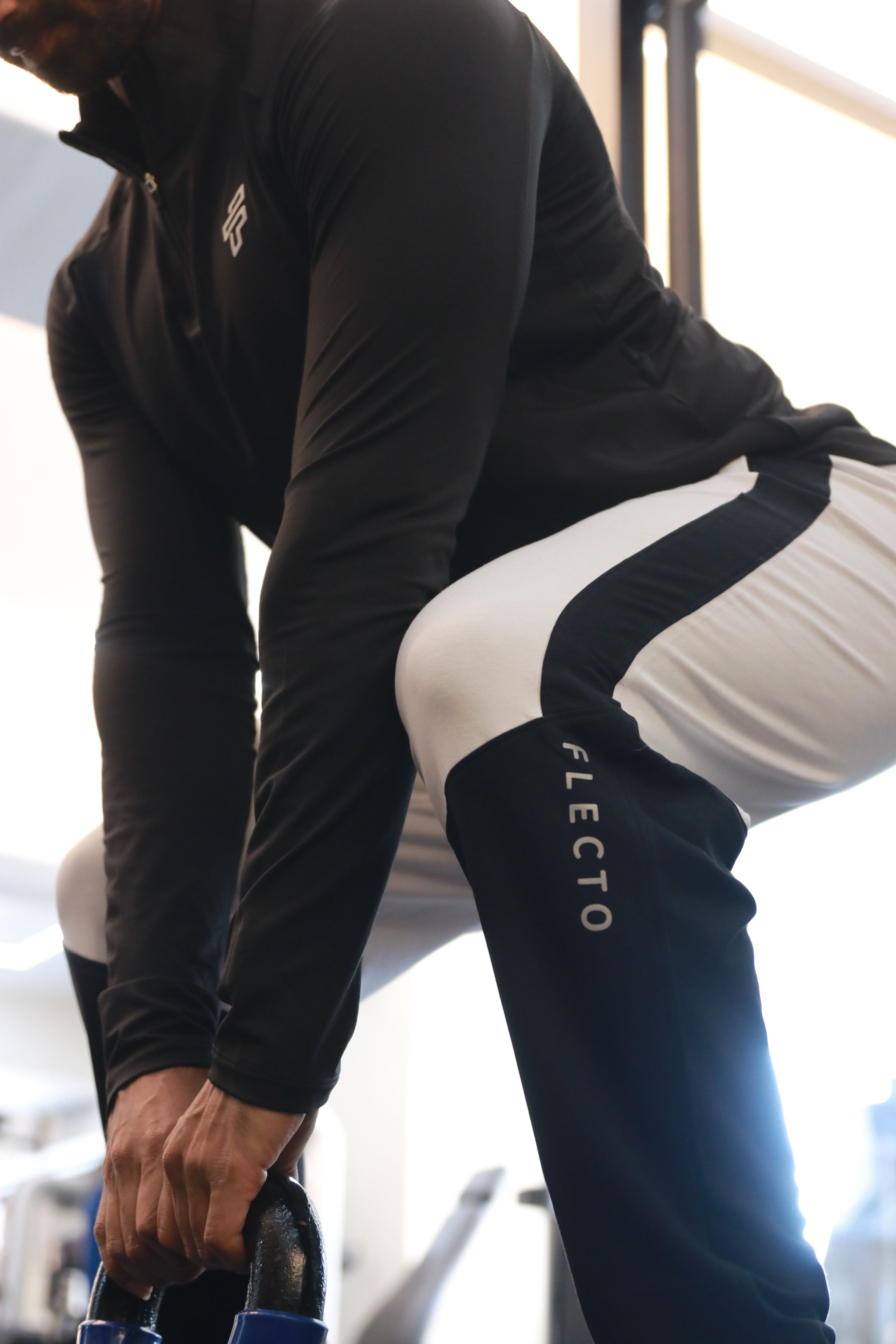 Flecto men’s gym bottoms designed for flexibility and daily workouts