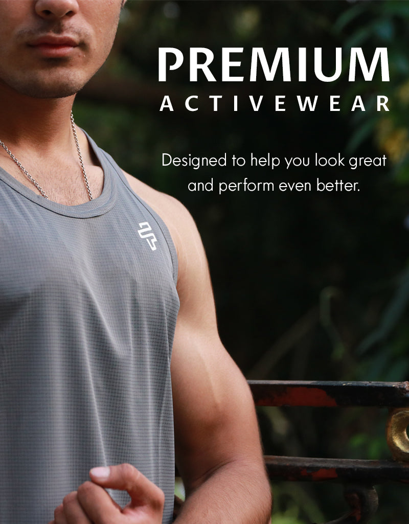 Men training in a Flecto tank top during high-intensity workouts